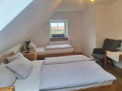 Ein Bett oder Betten in einem Zimmer der Unterkunft Bleckmanns Hof