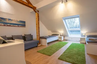 Ein Sitzbereich in der Unterkunft Wohnen wie zu Hause