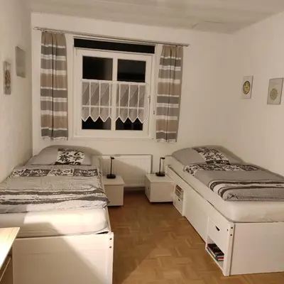 Ein Bett oder Betten in einem Zimmer der Unterkunft FEWO Altstadt Hückeswagen