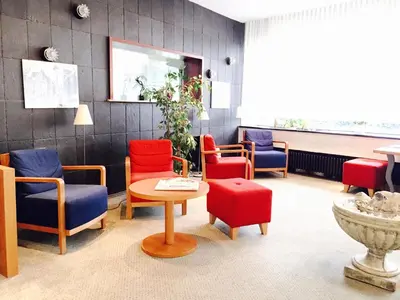 Ein Sitzbereich in der Unterkunft Hotel Imperial