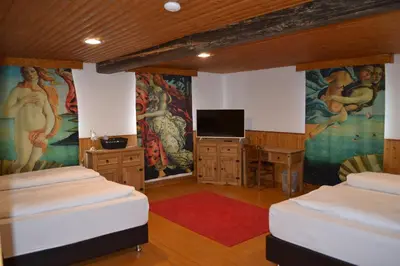 Ein Bett oder Betten in einem Zimmer der Unterkunft Hotel Altes Fährhaus Duisburg