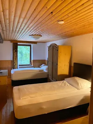 Ein Bett oder Betten in einem Zimmer der Unterkunft Hotel Altes Fährhaus Duisburg