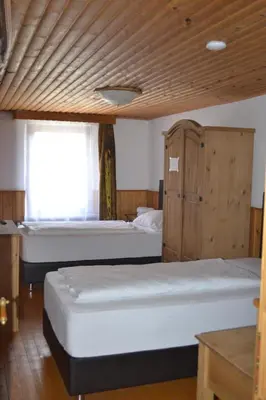 Ein Bett oder Betten in einem Zimmer der Unterkunft Hotel Altes Fährhaus Duisburg