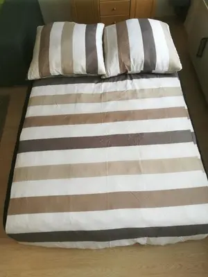 Ein Bett oder Betten in einem Zimmer der Unterkunft Ferienhaus Zoe 120 m2