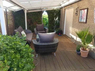 Ein Garten an der Unterkunft Alex