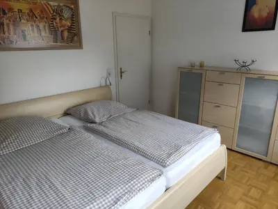 Ein Bett oder Betten in einem Zimmer der Unterkunft FEWO Hückeswagen 