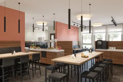 Ein Restaurant oder anderes Speiselokal in der Unterkunft Mintrops Concierge Hotel