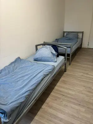 Ein Bett oder Betten in einem Zimmer der Unterkunft Expresszimmervermietung