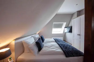 Ein Bett oder Betten in einem Zimmer der Unterkunft Hotel Altes Amtshaus