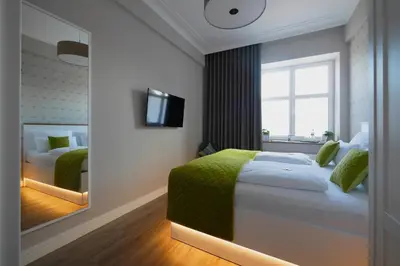 Ein Bett oder Betten in einem Zimmer der Unterkunft Hotel Altes Amtshaus