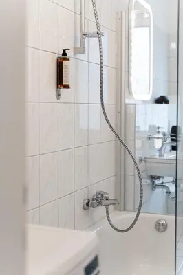 Ein Badezimmer in der Unterkunft JUNIK Apartments 