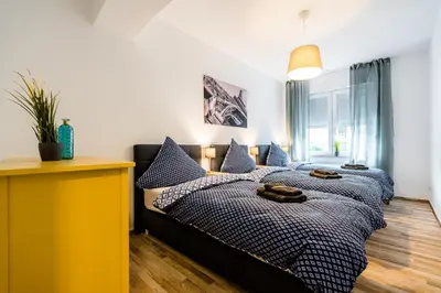 Ein Bett oder Betten in einem Zimmer der Unterkunft Comodo Apartments Solingen