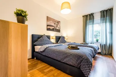 Ein Bett oder Betten in einem Zimmer der Unterkunft Comodo Apartments Solingen