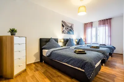 Ein Bett oder Betten in einem Zimmer der Unterkunft Comodo Apartments Solingen