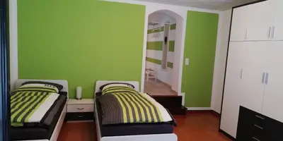 Ein Bett oder Betten in einem Zimmer der Unterkunft Ferienwohnung Sonnwald