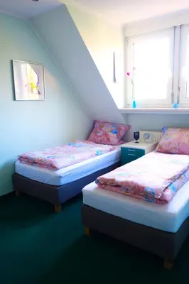 Ein Bett oder Betten in einem Zimmer der Unterkunft Aparthotel Messe Flughafen