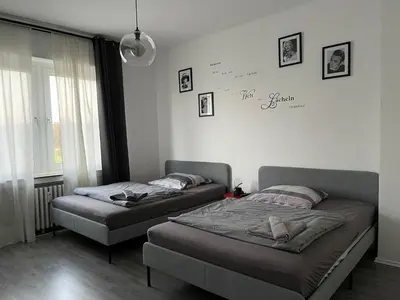 Ein Bett oder Betten in einem Zimmer der Unterkunft Ruhrpott Apartment Zentral
