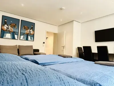 Ein Bett oder Betten in einem Zimmer der Unterkunft City Center Apartments Düsseldorf