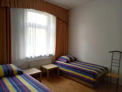 Ein Bett oder Betten in einem Zimmer der Unterkunft Apartment Haus Essen
