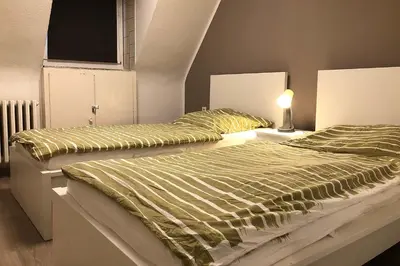 Ein Bett oder Betten in einem Zimmer der Unterkunft cosy three room apartment with flatscreen TV