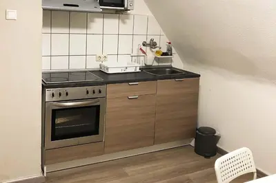 Küche/Küchenzeile in der Unterkunft cosy three room apartment with flatscreen TV
