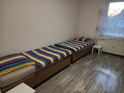 Ein Bett oder Betten in einem Zimmer der Unterkunft Apartment Essen-City
