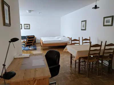 Ein Bett oder Betten in einem Zimmer der Unterkunft Apparthaus Arosa