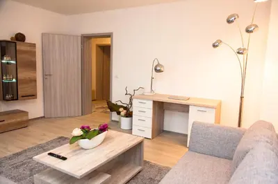 Ein Sitzbereich in der Unterkunft T&K Apartments near Messe Fair Trade Düsseldorf und Airport 2B