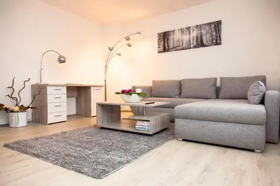 Ein Sitzbereich in der Unterkunft T&K Apartments near Messe Fair Trade Düsseldorf und Airport 2B