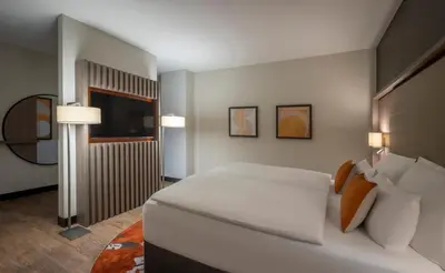 Ein Bett oder Betten in einem Zimmer der Unterkunft Clayton Hotel Düsseldorf City Centre