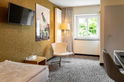 TV/Unterhaltungsangebot in der Unterkunft Hotel An der Gruga