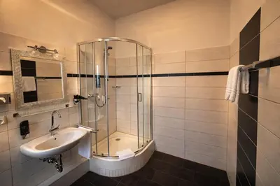 Ein Badezimmer in der Unterkunft Arena Hotel