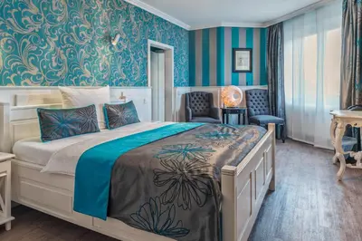 Ein Bett oder Betten in einem Zimmer der Unterkunft Hotel Prinz Anton