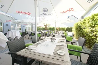 Ein Restaurant oder anderes Speiselokal in der Unterkunft Hotel Dampfmühle