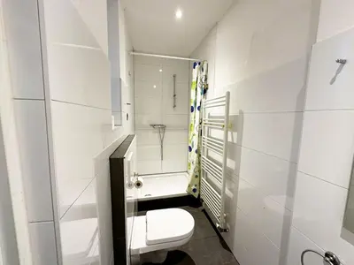 Ein Badezimmer in der Unterkunft cosy three room apartment with flatscreen TV
