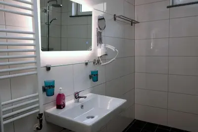 Ein Badezimmer in der Unterkunft Aparthotel Kompass A 201