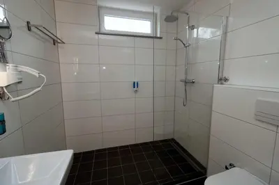 Ein Badezimmer in der Unterkunft Aparthotel Kompass A 201