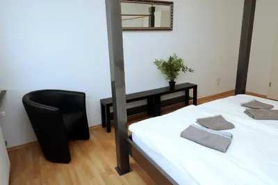 Ein Bett oder Betten in einem Zimmer der Unterkunft Aparthotel Kompass A 204