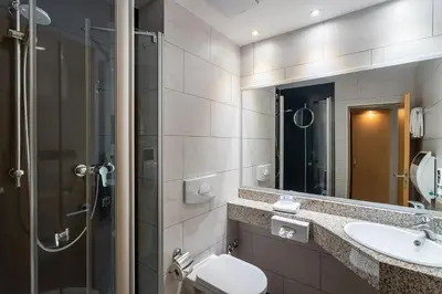 Ein Badezimmer in der Unterkunft Waldhotel Eskeshof