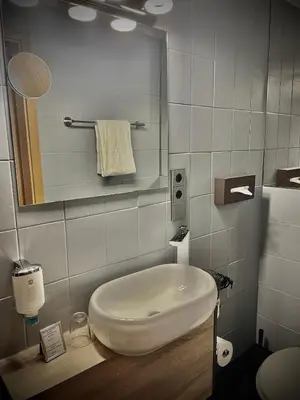 Ein Badezimmer in der Unterkunft Hotel Am Volksgarten
