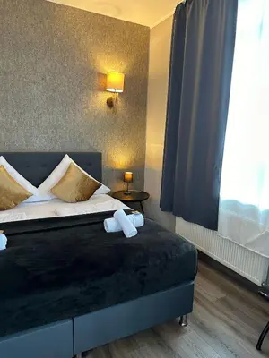 Ein Bett oder Betten in einem Zimmer der Unterkunft Hotel Restaurant zum Löwen