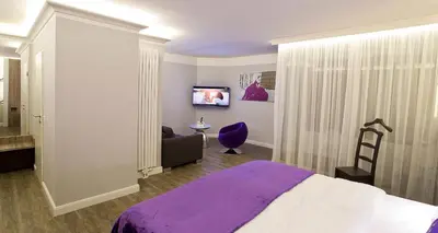 Ein Bett oder Betten in einem Zimmer der Unterkunft PLAZA INN stays design Dortmund