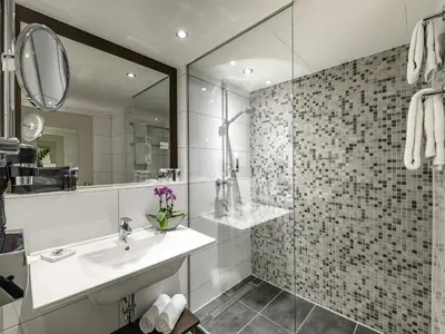 Ein Badezimmer in der Unterkunft Mercure Hotel Duisburg City