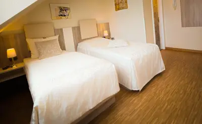 Ein Bett oder Betten in einem Zimmer der Unterkunft Hotel Carlton Mayfair