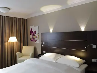 Ein Bett oder Betten in einem Zimmer der Unterkunft Mercure Hotel Hagen