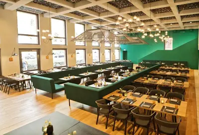 Ein Restaurant oder anderes Speiselokal in der Unterkunft Arcadeon