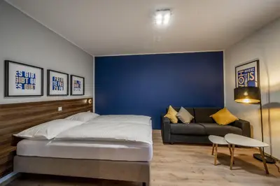 Ein Bett oder Betten in einem Zimmer der Unterkunft Hotel Zu Freunden