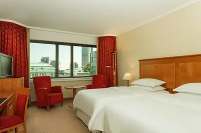 Ein Bett oder Betten in einem Zimmer der Unterkunft Sheraton Essen Hotel
