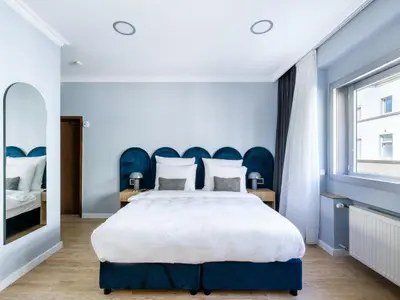 Ein Bett oder Betten in einem Zimmer der Unterkunft Numa Düsseldorf Artol