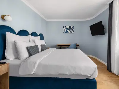 Ein Bett oder Betten in einem Zimmer der Unterkunft Numa Düsseldorf Artol